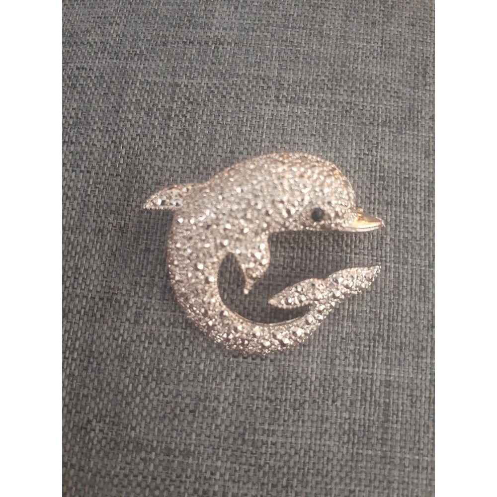 Vintage textured Silvertone Dolphin Brooch/pin with Rhinestone Eye